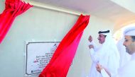 Minister of Transport and Communications H E Jassim bin Saif Al Sulaiti unveiling a plaque to mark the achievement of the milestone. 