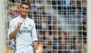 (FILES) This file photo taken on December 3, 2016 shows Real Madrid's Portuguese forward Cristiano Ronaldo gesturing during the Spanish league football match FC Barcelona vs Real Madrid CF at the Camp Nou stadium in Barcelona. AFP / Lluis GENE
