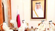 Emir H H Sheikh Tamim bin Hamad Al Thani with the Prime Minister of the Kingdom of Bahrain Prince Khalifa bin Salman Al Khalifa at the Sakhir Palace in Bahrain yesterday.