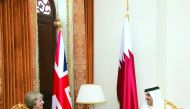 Emir H H Sheikh Tamim bin Hamad Al Thani with British Prime Minister Theresa May, in Manama, Bahrain, yesterday.