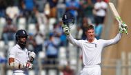 England's Keaton Jennings (R) celebrates his century as his team mate Moeen Ali looks on. (Reuters/Danish Siddiqui)