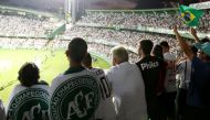 Fans gather at the Couto Pereira stadium during a symbolic event to remember the Chapecoense soccer team who died in a plane crash in Colombia, in Curitiba, Brazil, December 7, 2016. REUTERS/Rodolfo Buhrer
