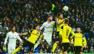 Real Madrid's Sergio Ramos (third left) vies for the ball with Borussia Dortmund's Sokratis (fourth left) during their UEFA Champions League match at the Santiago Bernabeu 
Stadium in Madrid, Spain on Wednesday.