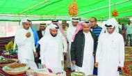 Officials and customers at the dates festival, which was inaugurated at Al Mazroua Yard yesterday.