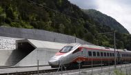 This file photo taken on May 31, 2016 shows an Italian train making its way at the north entrance of the new Gotthard Base Tunnel, the world's longest train tunnel, on the eve of its inauguration in Erstfeld.
Regular rail service through the world's long