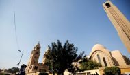 Egyptian riot police stand guard as Christians shout slogans in front of Cairo’s Coptic Cathedral after an explosion inside the cathedral in Cairo, Egypt December 11, 2016. REUTERS/Amr Abdallah Dalsh
