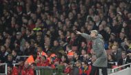 Arsenal's French manager Arsene Wenger gestures during the English Premier League football match between Arsenal and Stoke City at the Emirates Stadium in London on December 10, 2016. (AFP / Glyn KIRK)
