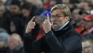 Liverpool's German manager Jurgen Klopp gestures from the touchline during the English Premier League football match between Liverpool and West Ham United at Anfield in Liverpool, north west England on December 11, 2016.  AFP / Lindsey PARNABY
