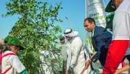 Members of the Qur’anic Botanic Garden (QBG) and the Philippine Institute of Civil Engineers (PICE) planting a tree.