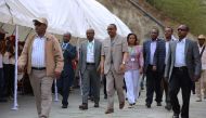 Ethiopia's Prime Minister Haile Mariam Dessalegn (C) attends the inauguration ceremony of the Gibe III dam in the Omo Valley on December 17, 2016. Ethiopia today inaugurated a hydroelectric dam that aims to double the country's electricity output, but whi