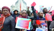 Members of the Congolese community in Belgium demonstrate in Brussels yesterday to ask the departure of Congo's President Joseph Kabila at the end of its mandate tomorrow.