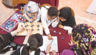 File photo of school students learning about experience-based science and engineering challenges at the Young Engineers and Scientists programme.

