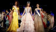 Winner of Miss World Miss Puerto Rico Stephanie Del Valle (C) stands with first runner up Miss Dominican Republic Yaritza Miguelina Reyes Ramirez (L) and second runner up Miss Indonesia Natasha Mannuela during the Miss World 2016 Competition in Oxen Hill,