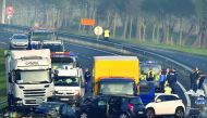 A view of the car accident, involving around fifty vehicles, which killed 5 people and injured 20, on the departmental road D12 between La Roche-sur-Yon and Les Sables d'Olonne, in western France, yesterday.