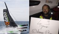 A handout picture released by Sodebo sailing team on December 25, 2016 shows French skipper Thomas Coville holding a poster reading 