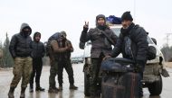 An evacuation convoy left east Aleppo that had been under siege by Assad regime arrive in Rashideen Town of Aleppo Syria on December 22, 2016 (Ahmed Al Ahmed / Anadolu Agency) 