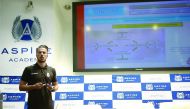 Cultural y Deportiva Leonesa’s head coach, Ruben De La Bariera delivers a lecture to coaches during a winter training camp at Aspire Academy yesterday. 