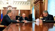 Russia's President Vladimir Putin (C), Foreign Minister Sergei Lavrov (L), and Defence Minister Sergei Shoigu attend a meeting at the Kremlin in Moscow, Russia December 29, 2016. Sputnik/Mikhail Klimentyev/Kremlin/via REUTERS