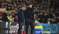 Tottenham Hotspur's Argentinian head coach Mauricio Pochettino (R) stands on the touchline during the English Premier League football match between Southampton and Tottenham Hotspur at St Mary's Stadium in Southampton, southern England on December 28, 201