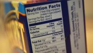 Nutrition facts are seen on a Diamond Food's Pop Secret microwave popcorn box is seen illustrated in New York, November 8, 2013. REUTERS/Shannon Stapleton