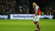 West Ham United's Sofiane Feghouli looks dejected after being sent off. Reuters / John Sibley 
