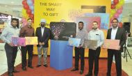Hardeep Singh (third left), Head of Centrepoint, Rajgopal R, (right), Marketing Manager of Landmark Group, with other officials at the launch of a new Gift Card and gifting options at Centrepoint showroom in Al Asmakh Mall, yesterday. Kammutty VP/ The Pen
