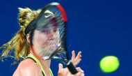 Ukraine's Elina Svitolina hits a return to Germany's Angelique Kerber during their Brisbane International match played at Pat Rafter Arena in Brisbane, Australia yesterday. Svitolina won 6-4, 3-6, 6-3.
