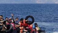 Drowning migrants being rescued on their way to Greece (Reuters) 