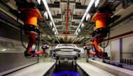  A robot is seen assembling Audi A8 models at their plant in Neckarsulm, Germany, May 21, 2015. REUTERS/Michael Dalder