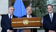 UN Secretary-General Antonio Guterres (C) speaks next to Greek Cypriot President Nicos Anastasiades (R) and Turkish Cypriot leader Mustafa Akinci during a press conference after the Conference on Cyprus, on the sidelines of the Cyprus Peace Talks, at the 
