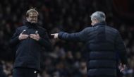 Liverpool manager Juergen Klopp reacts as Manchester United manager Jose Mourinho looks on. (Reuters / Phil Noble)