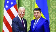 US Vice President Joe Biden (left) and Ukrainian Prime Minister Volodymyr Groysman shake hands during their meeting in Kiev, yesterday.