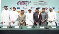 Qatar Motor and Motorcycling Federation President, Abdulrahman Al Mannai, Khalid Al Remaihi, General Manager of Losail Circuit Sports Club are seen along with QSTK 600 riders Saeed Al Sulaiti, Mashel Al Naimi and Nasser Al Malki and the drivers of the QTC