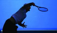Britain's Andy Murray serves during his Australian Open Men's Singles third round match against Sam Querrey of the US in Melbourne yesterday. Murray won 6-4, 6-2, 6-4 to advance.