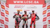 Mishal Al Naimi (centre), winner of race 1 and 2 of the first round of the Qatar Superstock 600 series, poses for a picture along with second and third place winners Sultan Al Sulaiti and Nasser Al Malki at the Losail International Circuit yesterday.