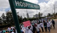 Kenyan doctors march during a strike to demand fulfilment of a 2013 agreement between their union and the government that would raise their pay and improve working conditions in Nairobi, Kenya. Photo: Reuters / Thomas Mukoya