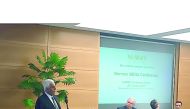 H E Abdullah bin Hamad Al Attiyah speaking at the NUMOV meeting in Berlin recently.