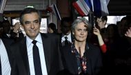 Francois Fillon, former French prime minister, member of The Republicans political party and 2017 presidential candidate of the French centre-right, arrives with his wife Penelope Fillon (R) to attend a political rally in Paris, France, January 29, 2017. 