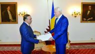 Minister of Foreign Affairs of the Republic of Romania Teodor Melescanu (right) receiving a copy of credentials of Abdullah bin Nasser Al Humaidi as Extraordinary and Plenipotentiary Ambassador of Qatar to Romania. Romania's Foreign Minister wished the Qa