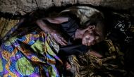 A woman, 60, who is suffering from malaria rests in her house at Kagorwa Pygmy camp on Idjwi island in the Democratic Republic of Congo, November 22, 2016 (REUTERS / Therese Di Campo) 