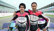Saeed Al Sulaiti poses for a picture with 17-year-old Abdullah Al Qubaisi, the youngest rider in the championship.