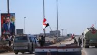 Syrian army soldiers man a checkpoint along a road in Aleppo, Syria February 1, 2017. REUTERS/Ali Hashisho
