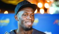Olympic champion Usain Bolt speaks during a press conference in Melbourne yesterday. 