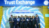 India's ambassador to Qatar, P Kumaran, and senior management members of Trust Exchange Company inaugurating the relocated showroom at Al Khor.
