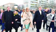 King Willem-Alexander (centre right) and Queen Maxima (centre left) of The Netherlands walk next to Leipzig's mayor Burkhard Jung (left) during a visit in Leipzig, eastern Germany, yesterday.