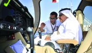 Minister of Transport and Communications H E Jassim bin Saif Al Sulaiti at the cockpit of an aircraft during the 10th Al Khor Fly-In Day 2017, at Al Khor airport yesterday. Pic: Baher Amin/ The Peninsula