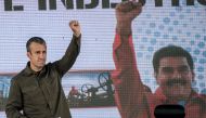 This file photo taken on January 31, 2017 shows Venezuelan Vice-President Tareck El Aissami gesturing during a rally with workers of PDVSA state-owned oil company in Caracas. El Aissami hit back at the United States on February 14, 2017 for labeling him a