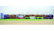 Participating teams of a cricket tournament poses for a group photo at West Bay Ground. The Qatar Cricket Association (QCA) organised the event to celebrate the National Sport Day. QCA Board President Yousef Jeham Al Kuwari inaugurated the tournament. Pic