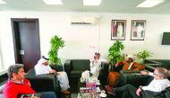Losail Circuit Sports Club and Hamad Medical Corporation (HMC) officials discussing arrangements for FIM World Motocross World Championship that will take place onFebruary 24 to 25 at Losail Circuit Sports Club.  