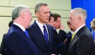 US Secretary of Defence James Mattis (right) speaks with Nato Secretary General Jens Stoltenberg (centre) next to British Defence Secretary Michael Fallon before the Nato Defence Ministers’ meeting in Brussels, yesterday.